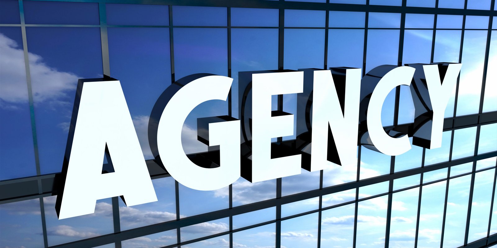 Agency Sign Modern Glass Building Facade Scaled
